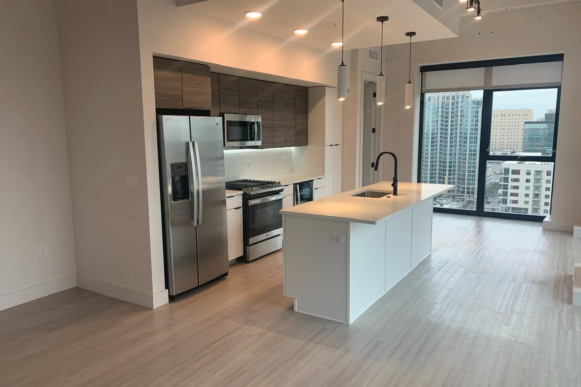 Finished residence kitchen at Elev8 Luxury Apartments — interior framing and drywall by Epic Contractors
