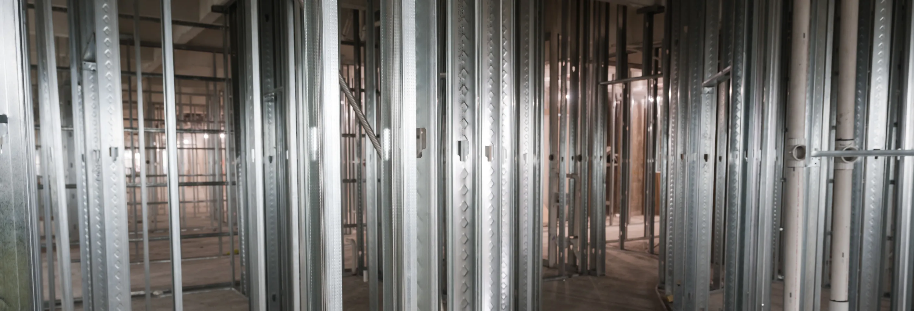 The Watt at Westlake — office floor plate cleared and framed for residential conversion following full gut demolition by Epic Contractors, Houston, Texas