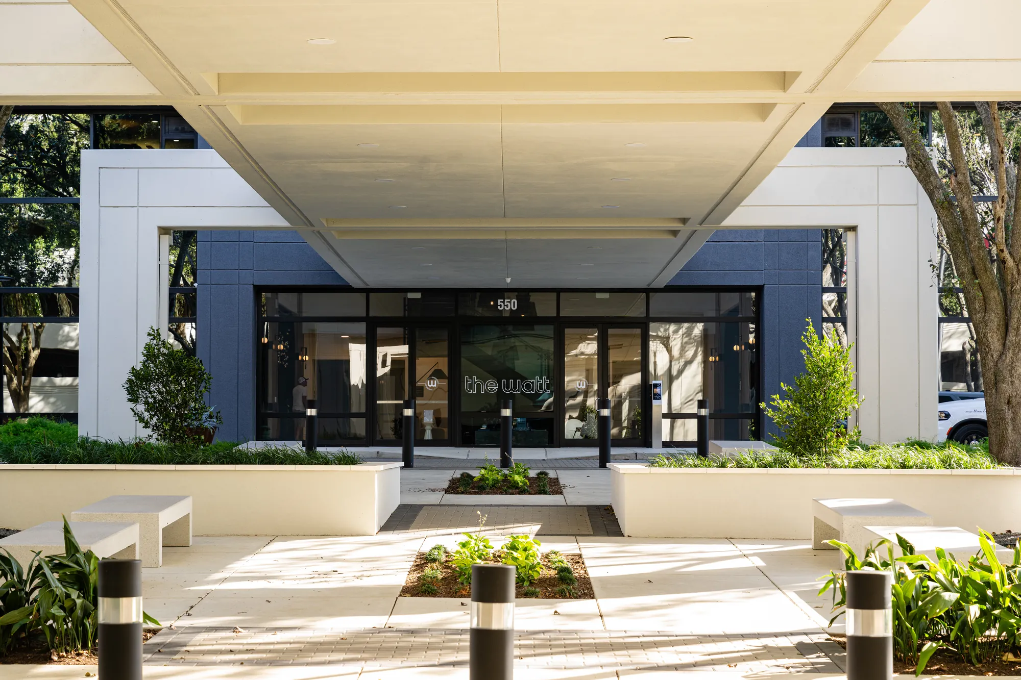 Main entrance canopy at The Watt at Westlake — cast stone and exterior detail by Epic Contractors