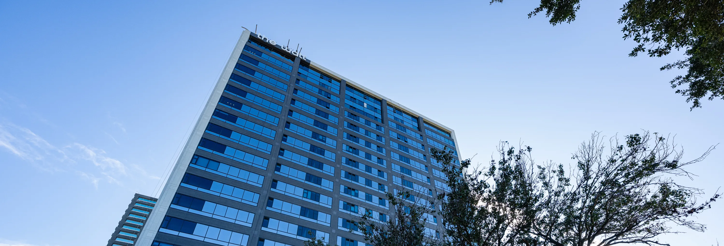 The Watt at Westlake — 19-story office-to-residential high-rise conversion in Houston, framing and drywall by Epic Contractors