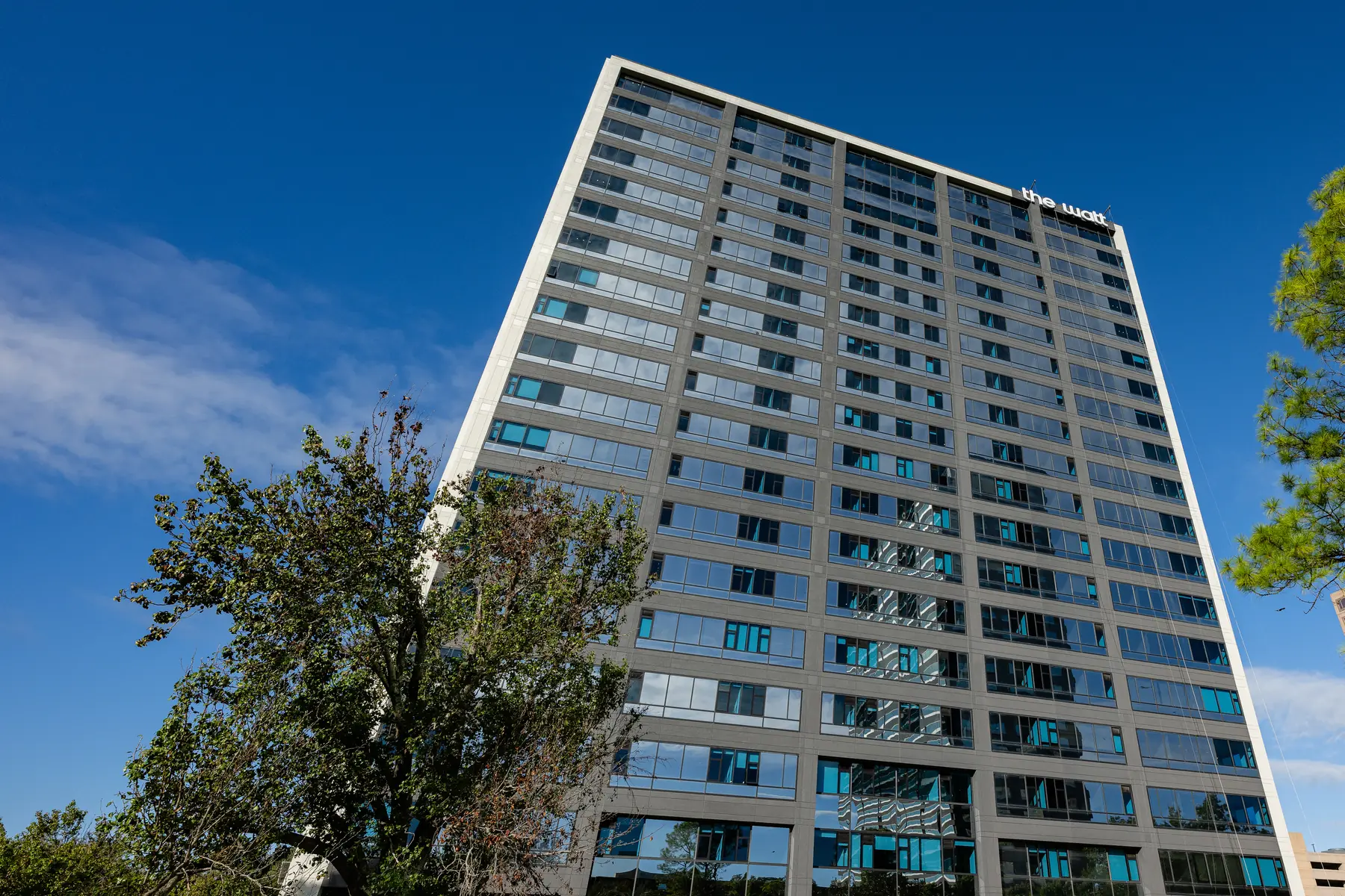 The Watt at Westlake — the completed 19-story office-to-residential conversion tower in Houston, TX.